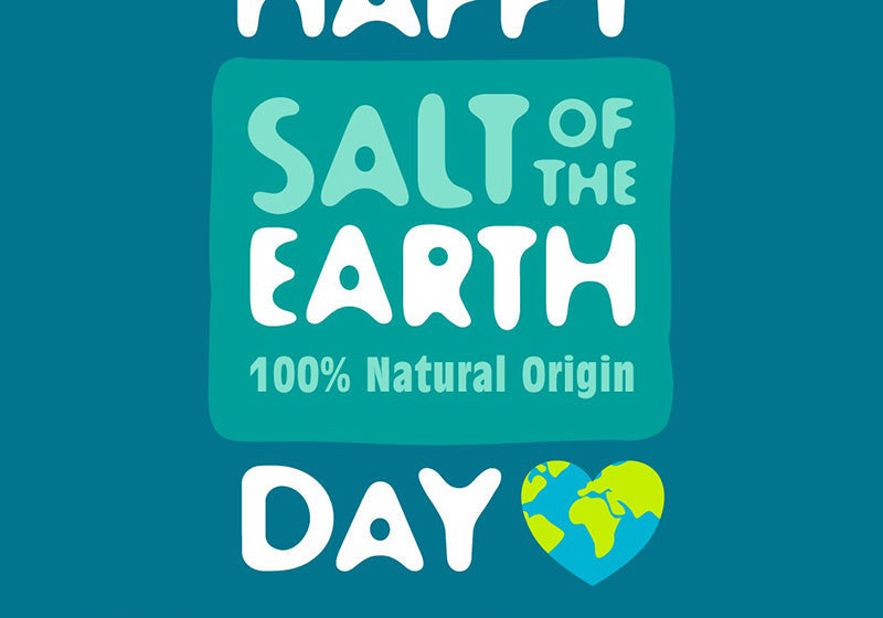 Happy Earth Day graphic with Salt of the Earth logo, '100% Natural Origin' text, and a heart-shaped Earth icon. Text reads 'It's in our name & in our nature'